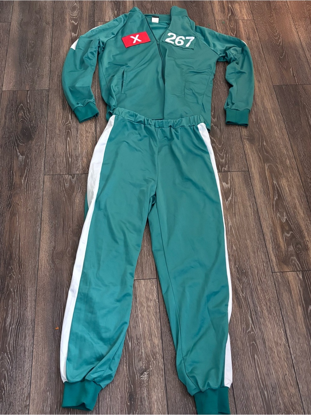 Netflix Teal Green Track Set with White Side Stripes and Red Patch